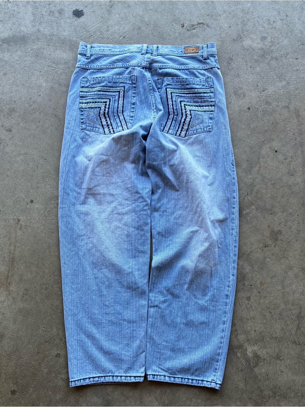Knockout Light Wash Blue Denim Jeans with Geometric Back Pocket Stitching